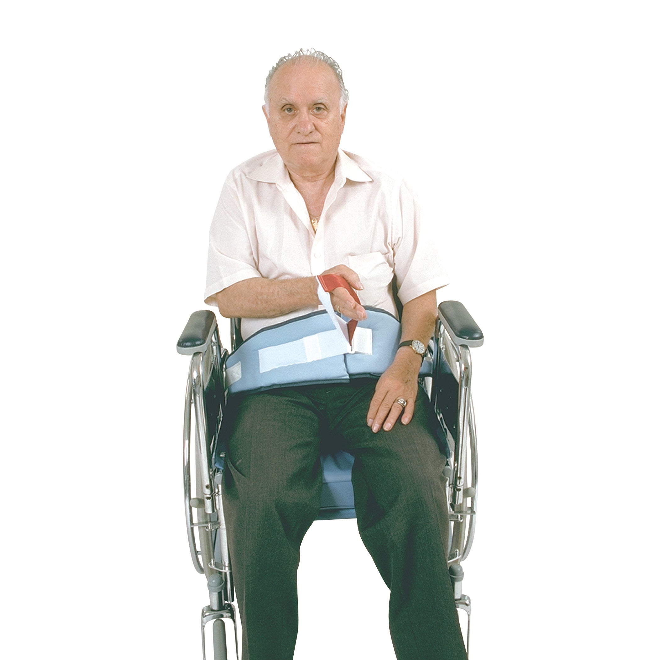 An elderly man sits in a wheelchair using a SkiL-Care Easy-Release Soft Wheelchair Belt, securing him comfortably.