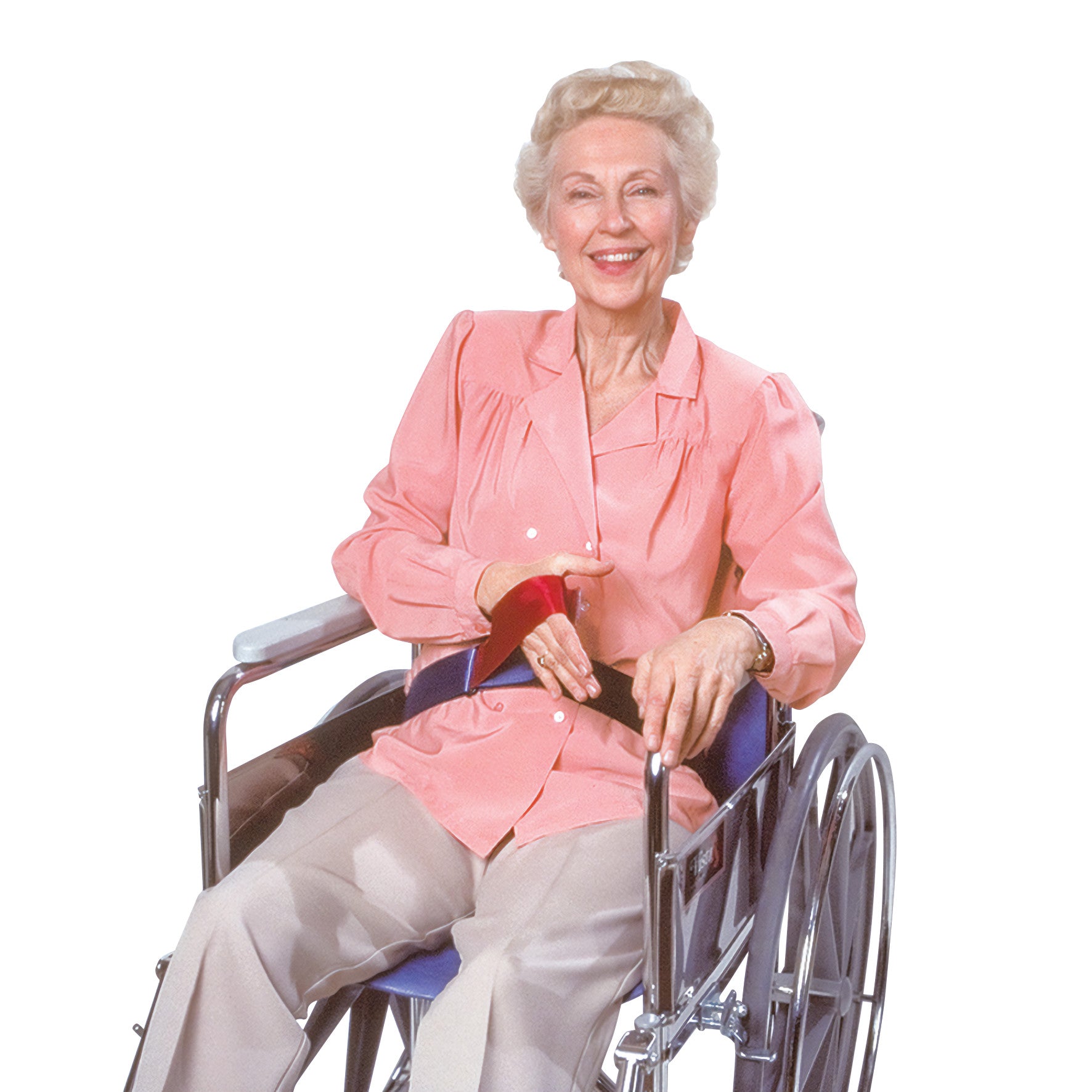 Elderly woman in a wheelchair wears the SkiL-Care Easy-Release Nylon Wheelchair Belt, smiling and holding the release.