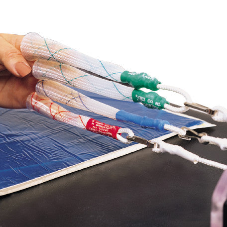 A hand holds several Allen Sterile Mesh Single Finger Traps in different colors, with attached cords and clips on a blue surface.