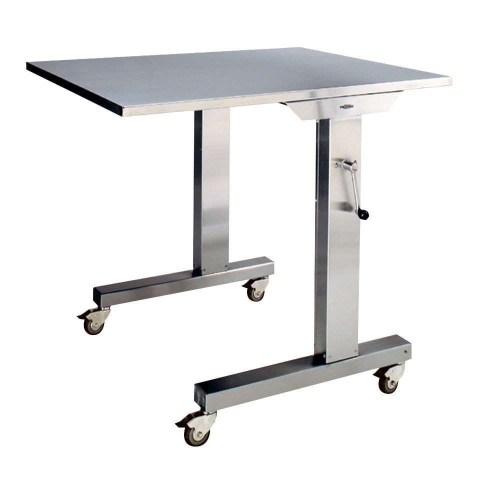 The Pedigo Over Operating Table is a stainless steel table on wheels, featuring an adjustable height crank mechanism.