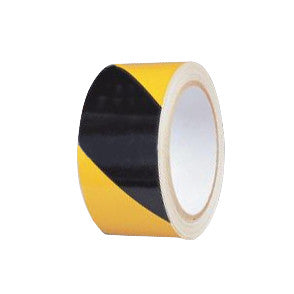 A roll of Heavy-Duty Vinyl Caution Tape, featuring diagonal yellow and black stripes, is shown on a white background.
