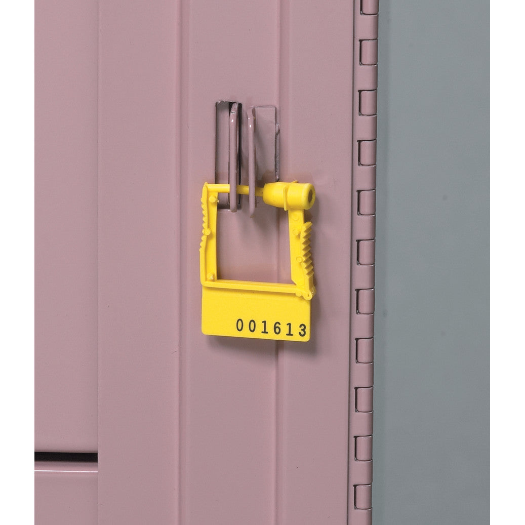 A yellow "AliMed Cart Accessory: Breakaway Lock Plastic Seals" with the number 001613 locks a pink metal cabinet.