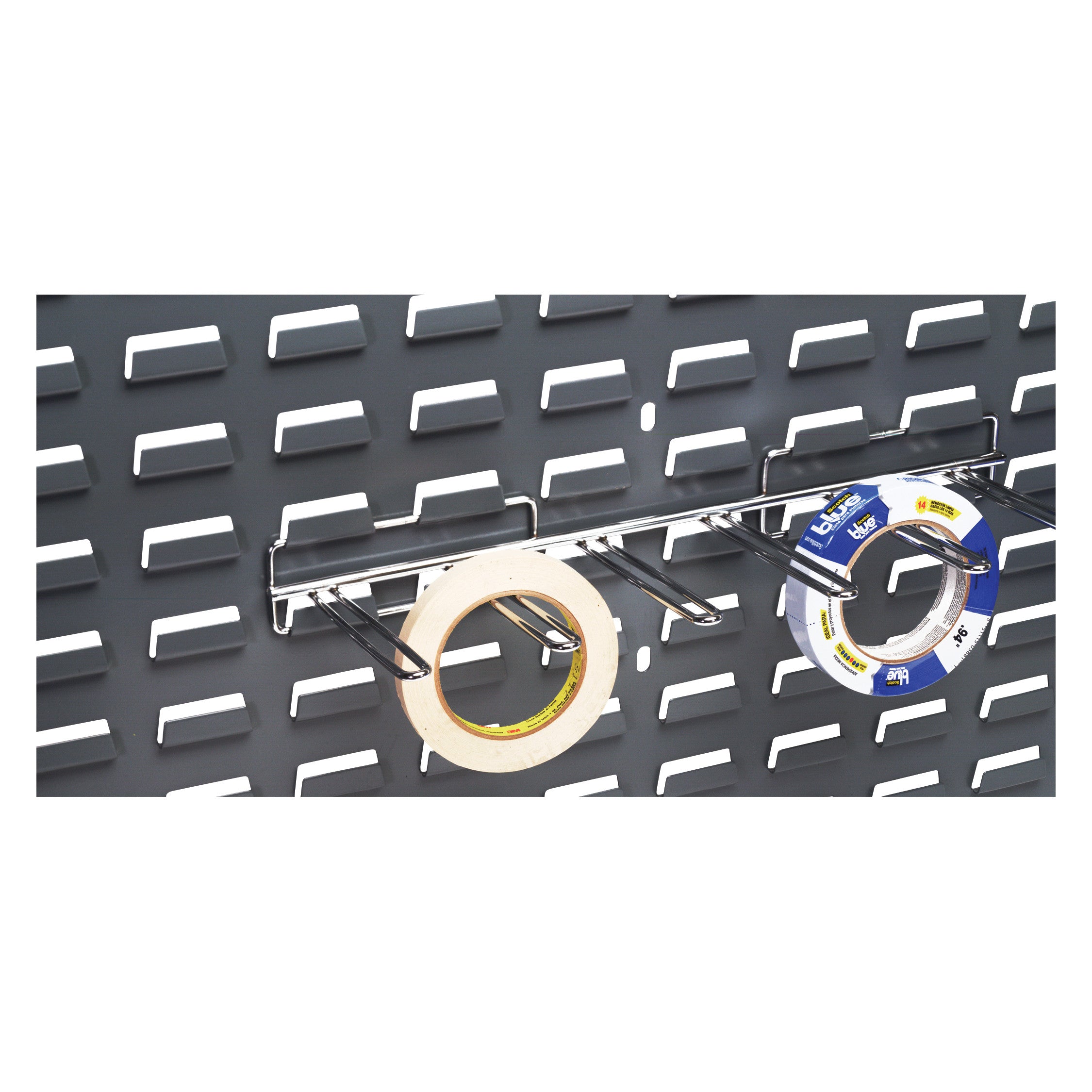 A Tape/Reel Holder for Quantum Solid Louvered Panel is mounted on a gray panel, holding two rolls of tape on metal hooks.