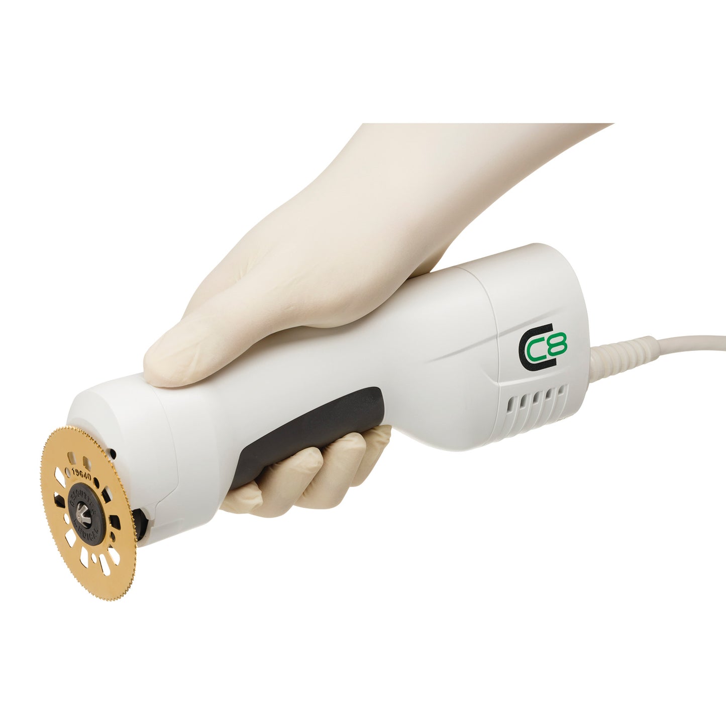 A gloved hand holds a DeSoutter CleanCast CC8 Electric Cast Saw with a circular blade and ergonomic white handle.
