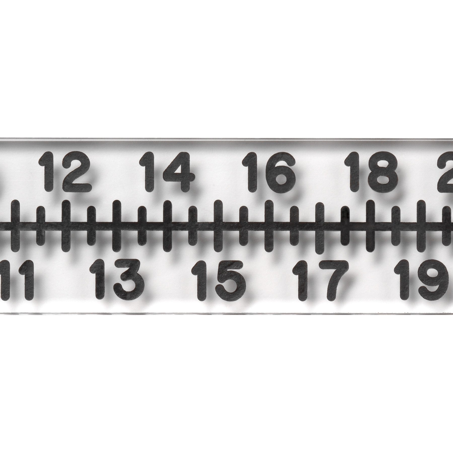 Close-up of a Radiopaque Acrylic Scale, showing numbers 11 to 20 with black markings on a transparent background.