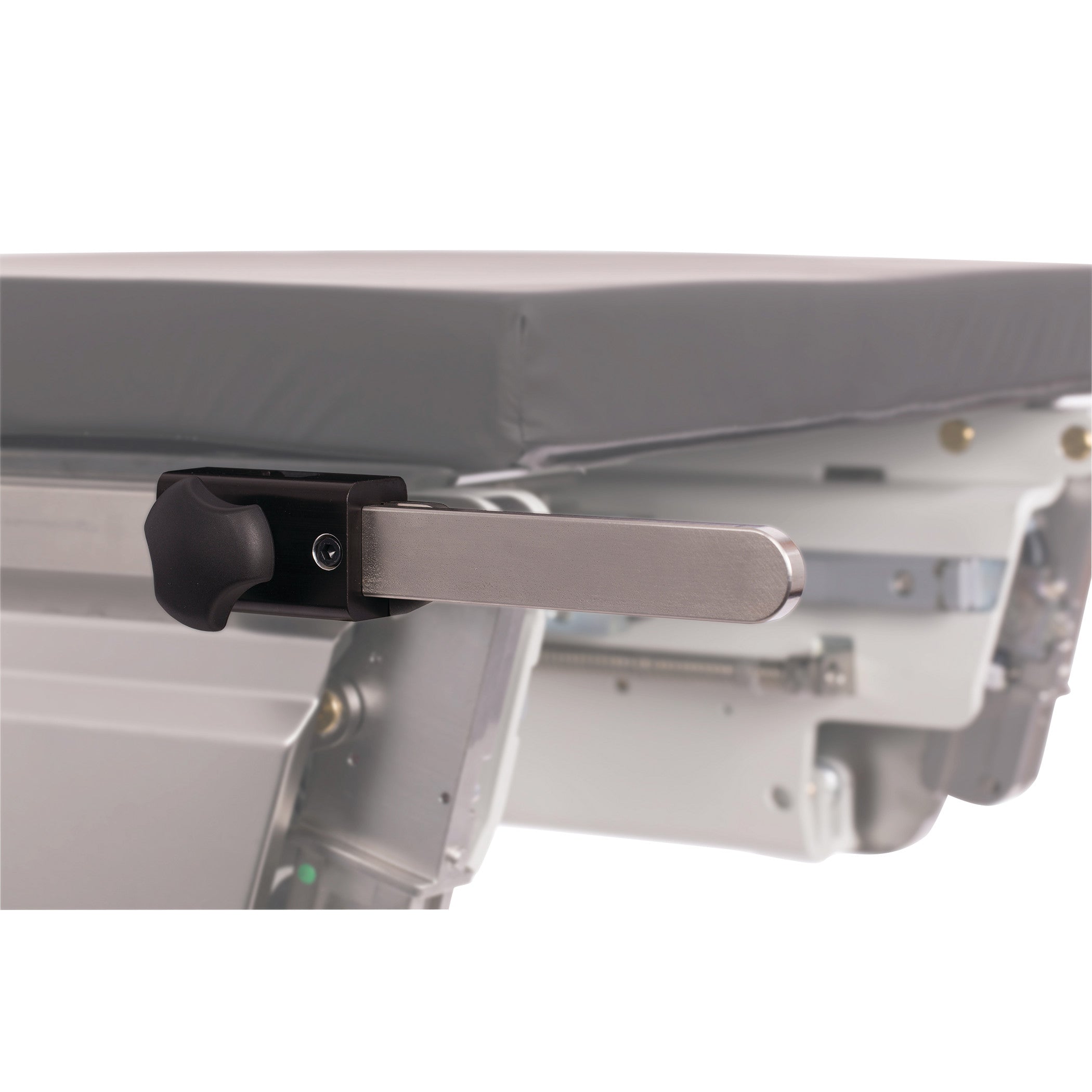 The KYRA Side Rail Extender is attached to a hospital bed, featuring a metal arm and a black adjustment knob.