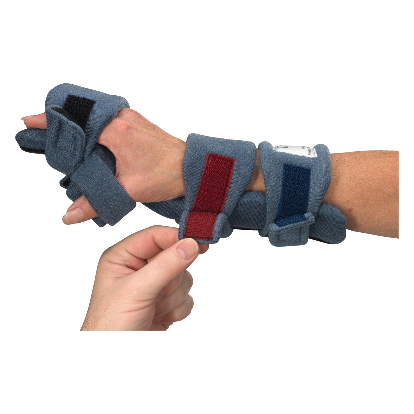 A hand is being fitted with an OCSI DynaPro Resting Hand WHFO brace, featuring adjustable straps in red and blue.
