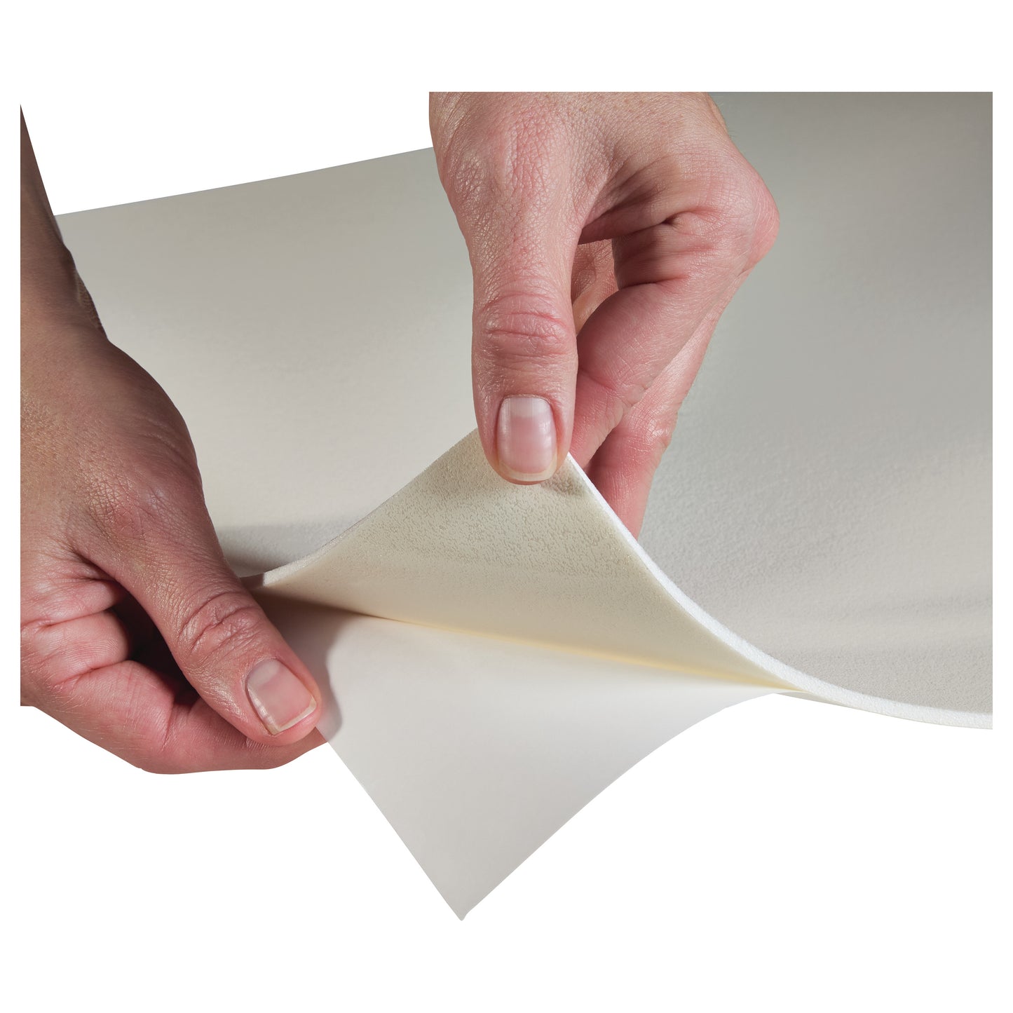 Hands peeling back a sheet of AliMed AliPlast 4E, Self-Stick foam. It's smooth and flexible, designed for easy application.