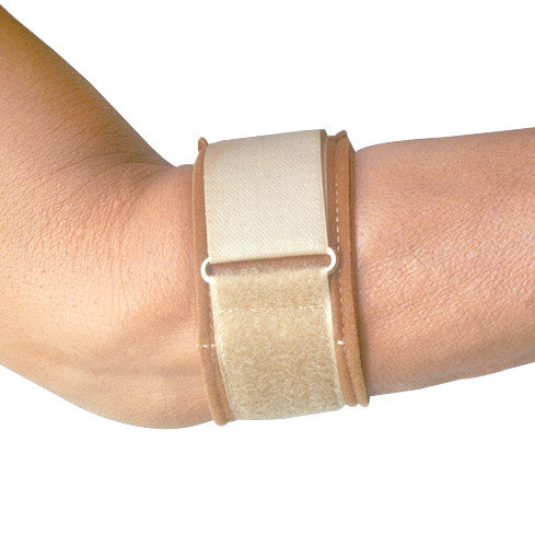 A Cho-Pat Tennis Elbow Strap is wrapped around a forearm for support and compression. Beige with a hook and loop closure