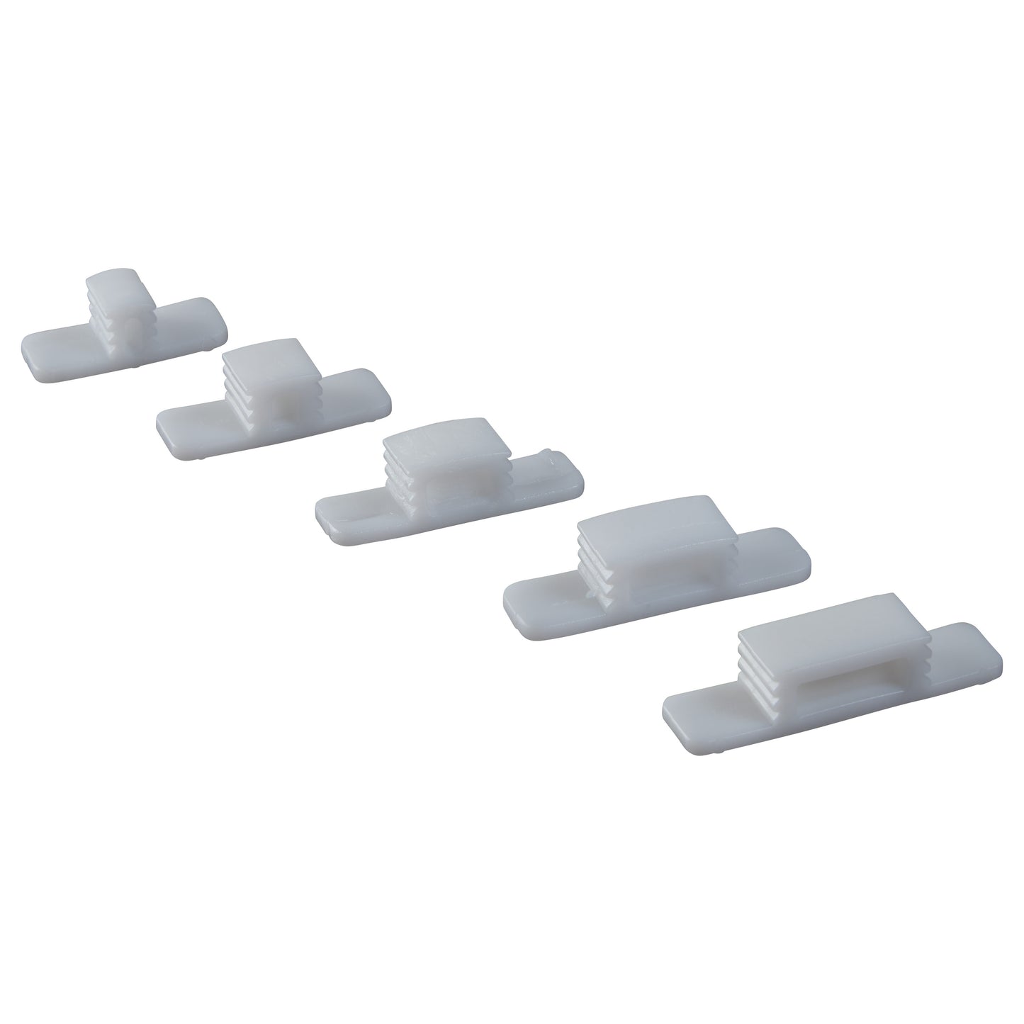 Five increasing sizes of white plastic wedges, part of the CastWedge Starter Set, arranged in a straight, ascending order.