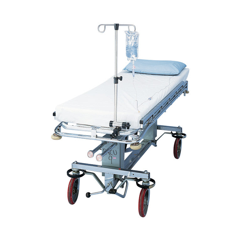 A Pryor Versa-Pole medical stretcher with an IV pole, blue pillow, and white sheet, featuring large red wheels for mobility.