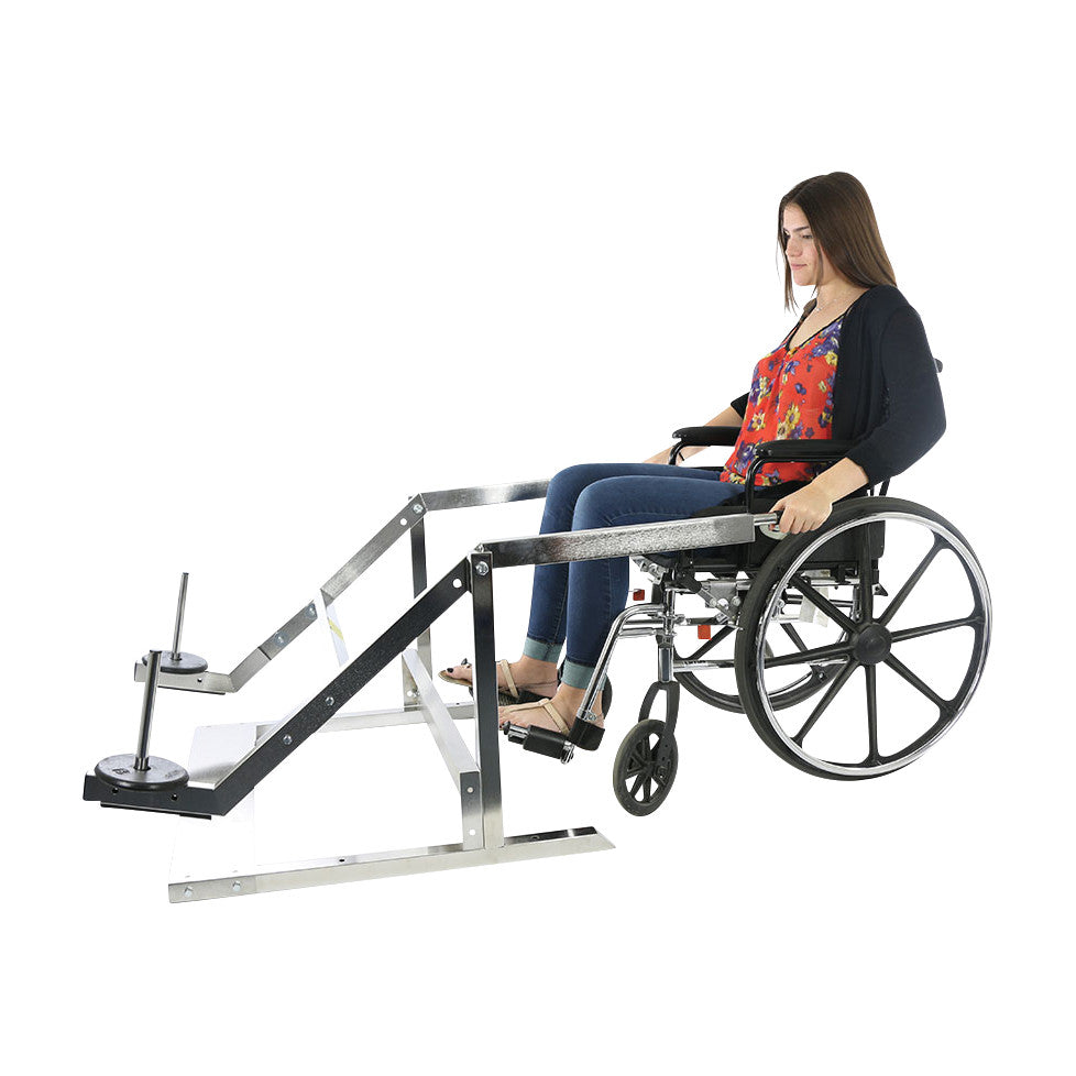 A woman in a wheelchair uses the CanDo Rickshaw Rehab Exerciser, a metal resistance exercise device designed for rehabilitation.