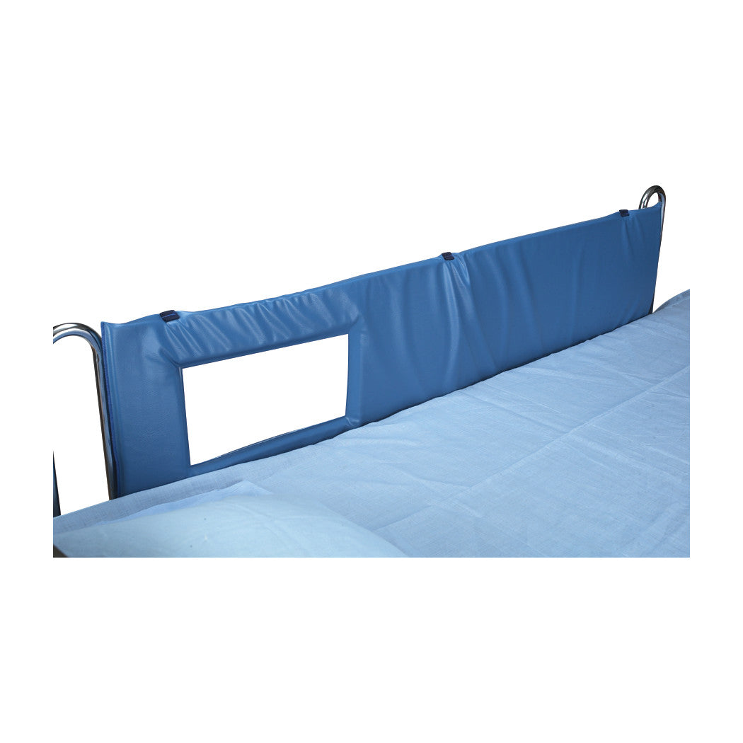 SkiL-Care Thru-View Vinyl Bed Rail Pad is a blue padded cover with a transparent window, attached to a bed rail for protection.