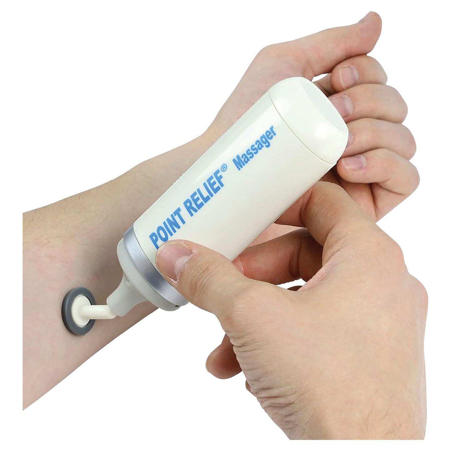 A person uses a Point Relief Massager on their forearm, holding the device with both hands.