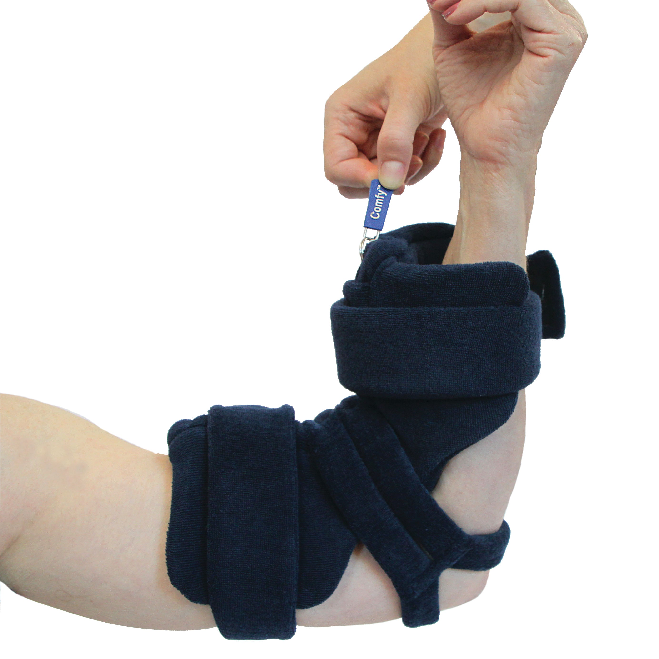 A person adjusts the Comfy Splints Adult Locking Elbow Orthosis, featuring padded dark blue straps for elbow support.