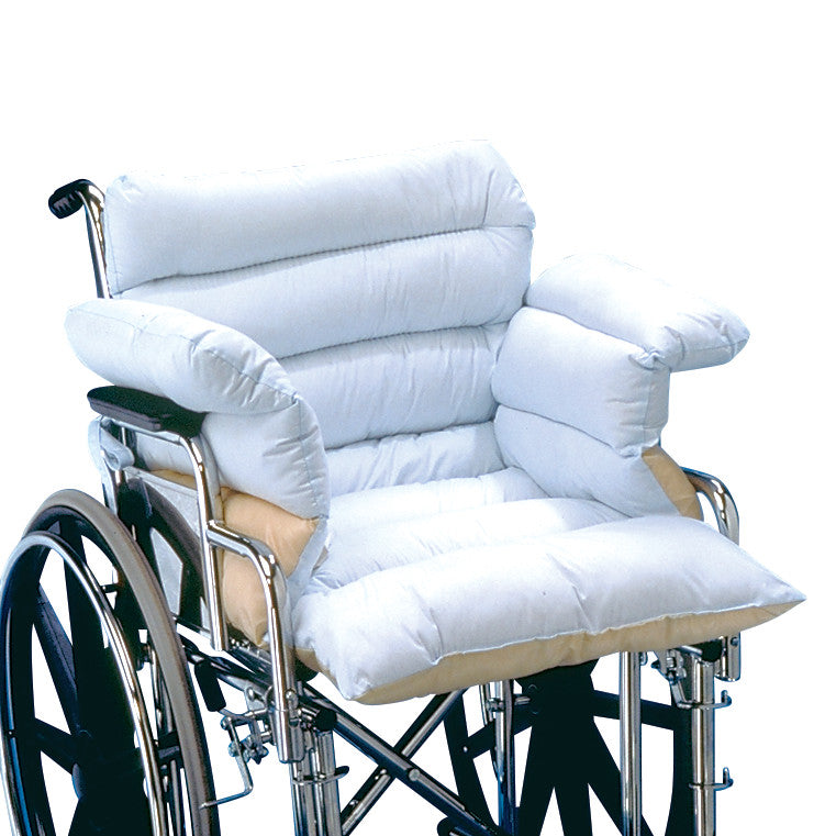 A wheelchair with soft, light-colored Spenco Wheelchair Padding on the seat, backrest, and armrests for added comfort.