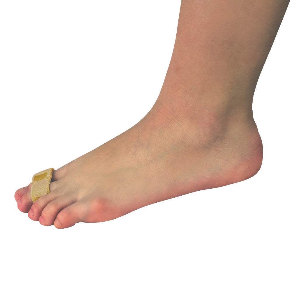 A foot wearing a Silipos Gel Splint on the big toe, with a beige strap securing it, set against a plain white background.