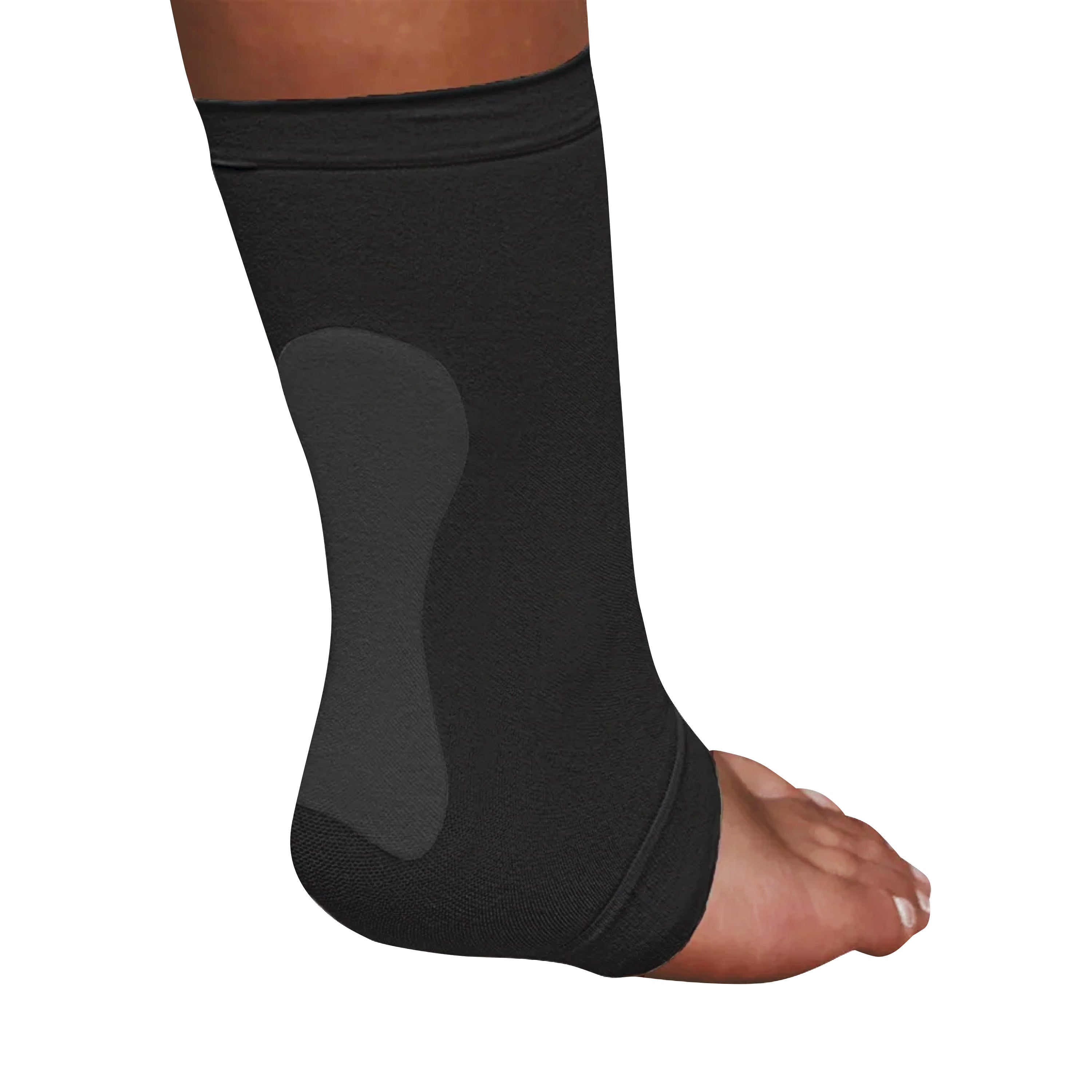 A person wears Silipos Active Gel Achilles Heel Sleeves on their foot and lower leg, showing a black compression sleeve design.