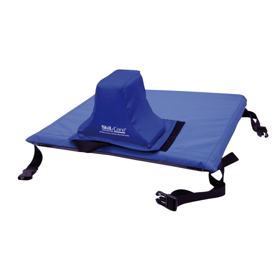 SkiL-Care E-Z Transfer Slider Pommel is a blue padded device with straps, used to assist transfers and maintain positioning.