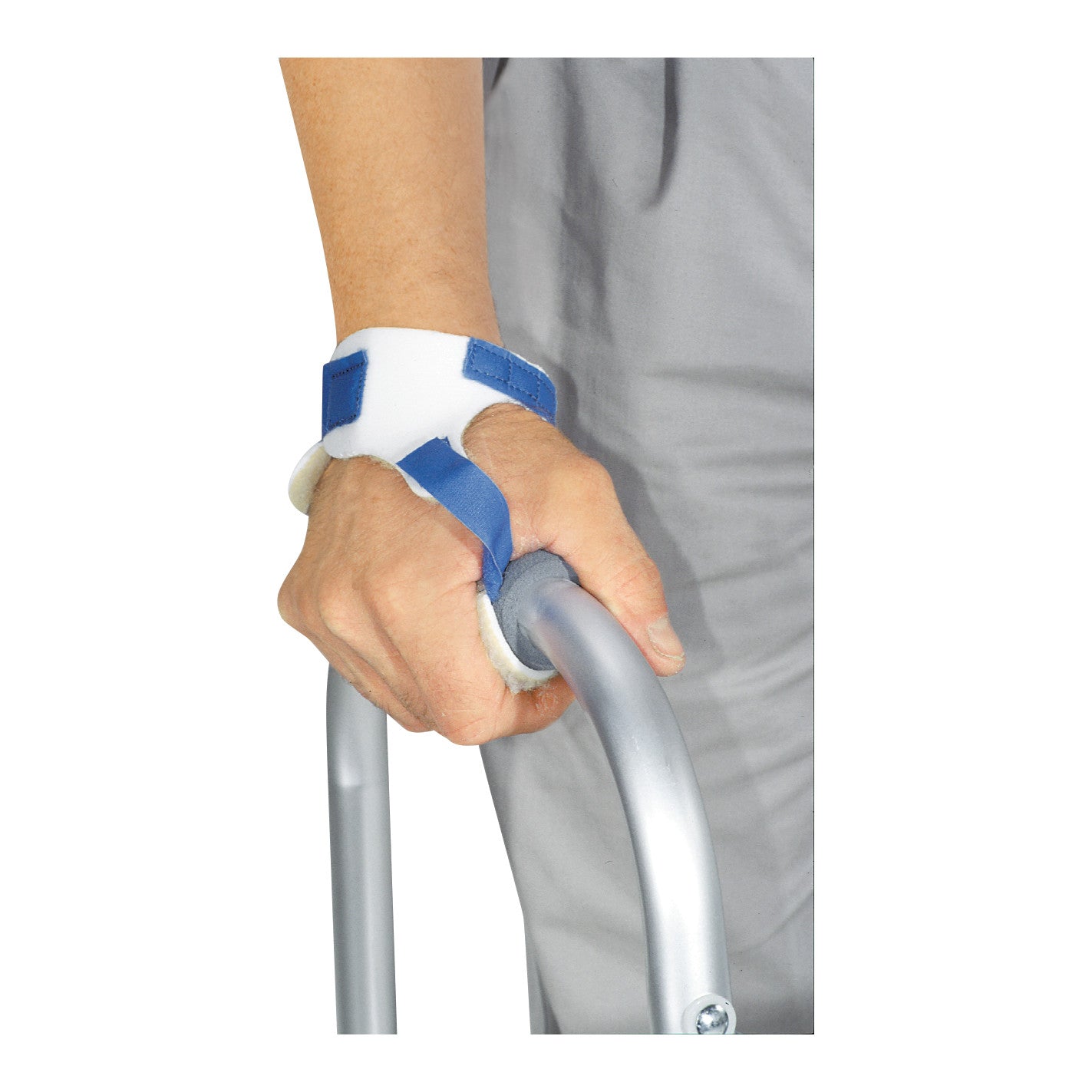 A hand using the AliMed Hand Walker Cuff to grip a metal walker handle. The cuff is white and blue, providing support.