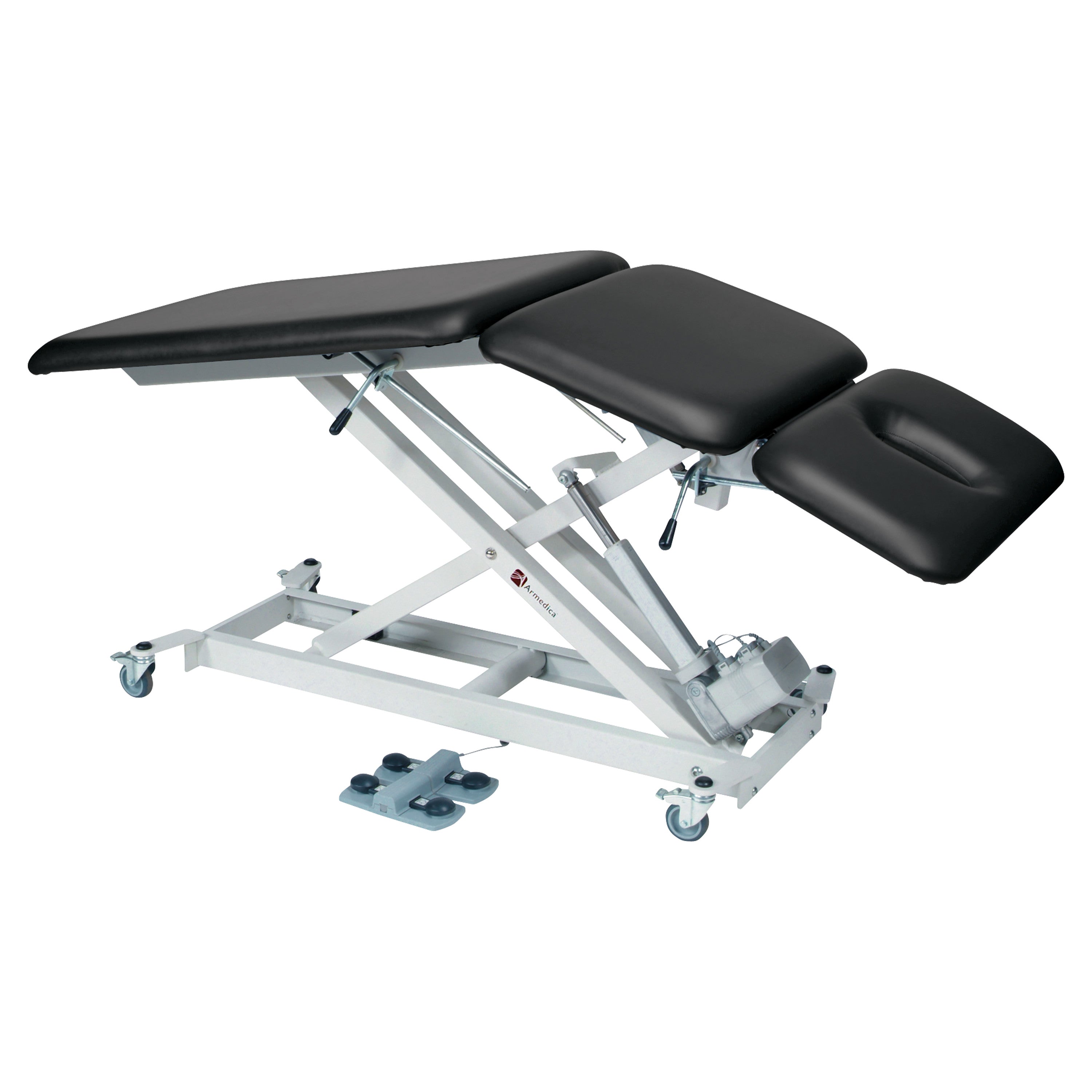 The Armedica AM-SX3000 Treatment Table is an adjustable, black-cushioned medical table with a metal frame and caster wheels.