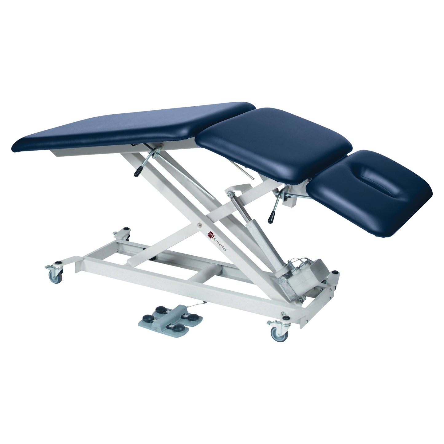 The Armedica AM-SX3000 Treatment Table, featuring a padded surface, adjustable sections, and wheels for mobility, is shown.