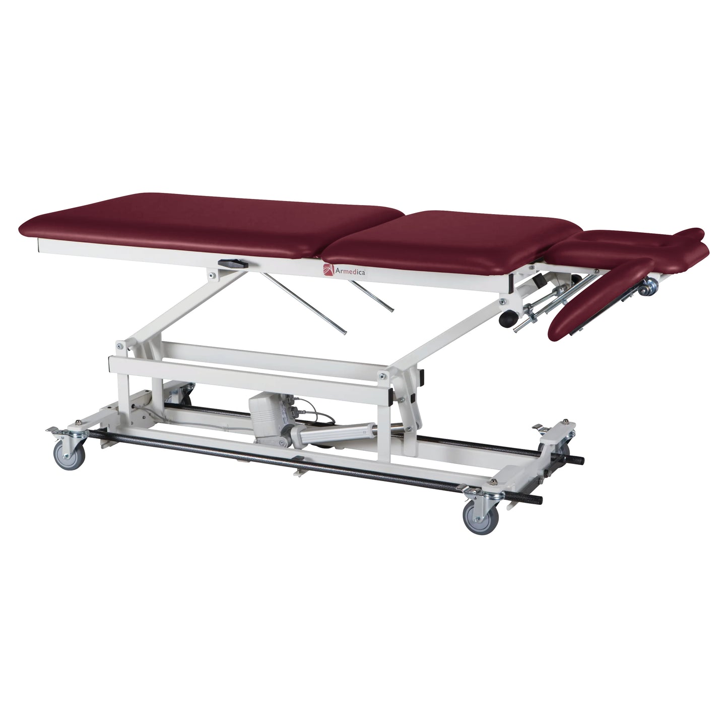 The Armedica AM-BA550 Treatment Table features three burgundy cushioned sections, adjustable height, and caster wheels for mobility.