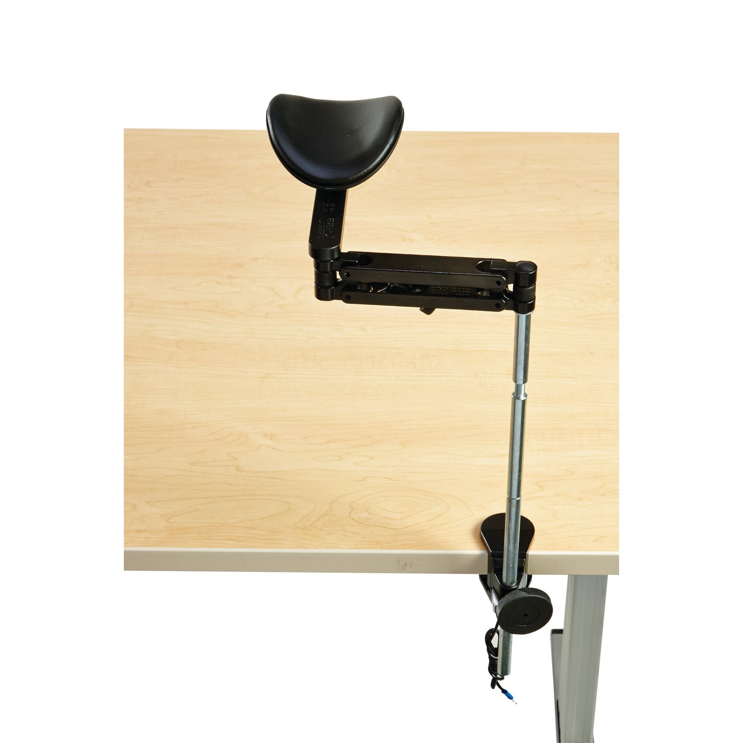 The ErgoRest Extended Height Articulating Forearm Support with ESD Protection is attached to the edge of a light wood table.