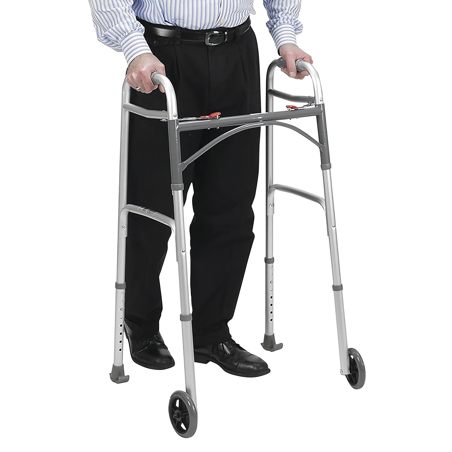 A person stands with a Drive Medical Deluxe Folding Walker, featuring two wheels and adjustable height. The walker is silver.
