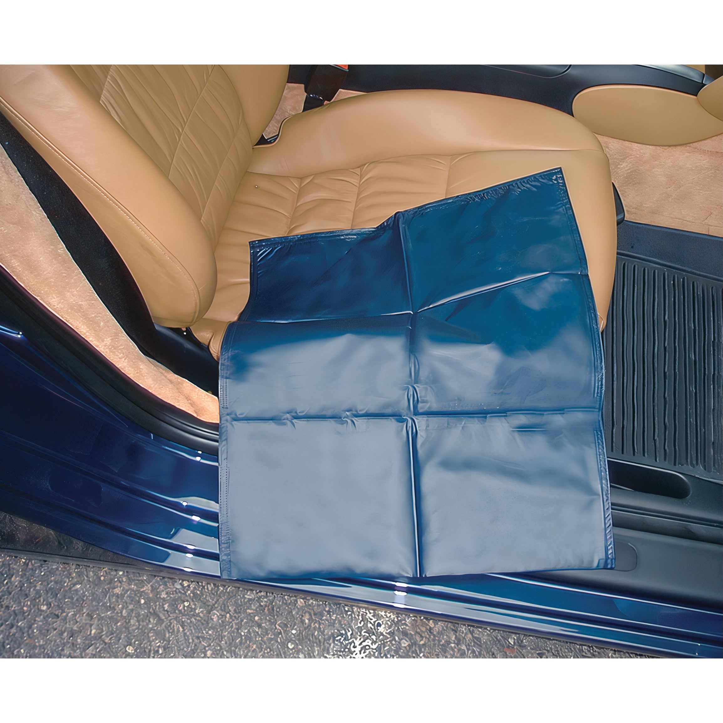 A SafetySure Car Ease is placed on a tan car seat, extending partially over the side, with the car door open beside it.
