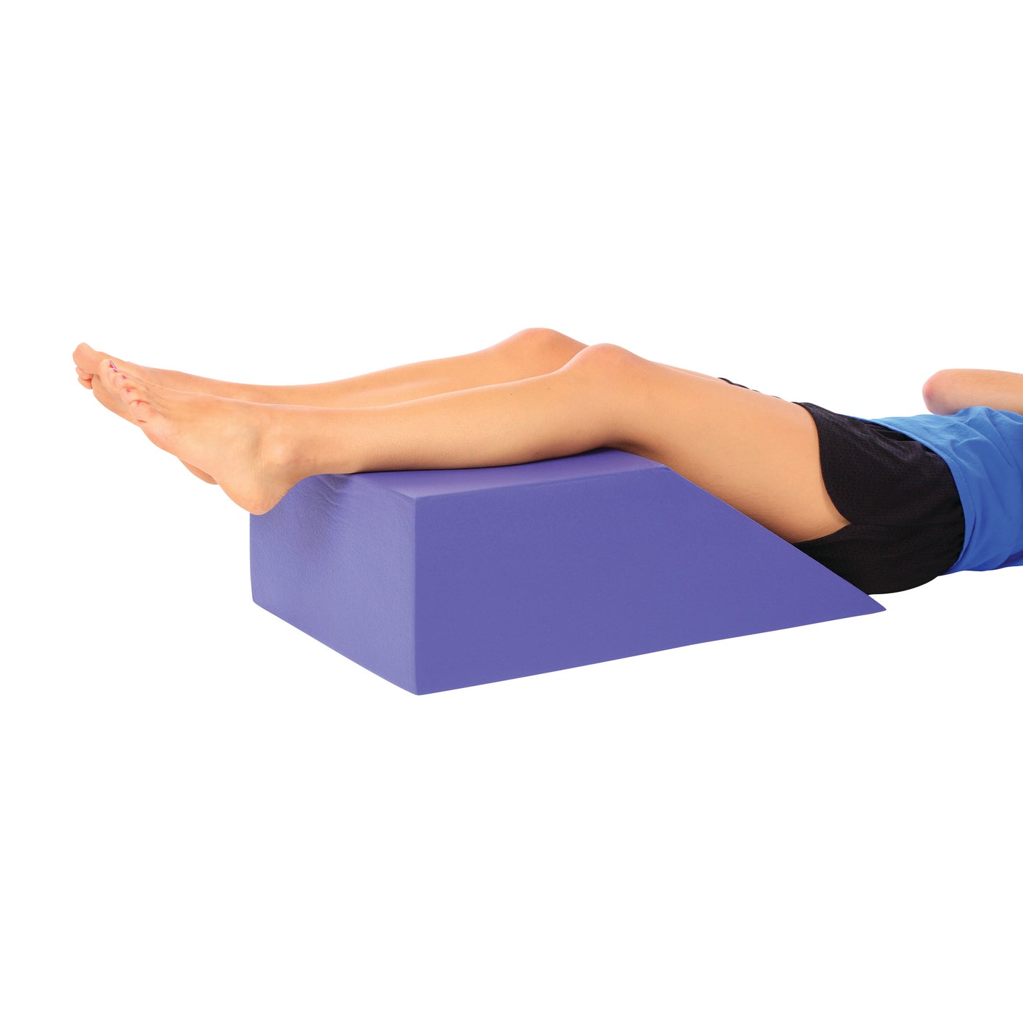 A person rests their legs on an AliMed Tuff-Coat Bed Wedge, a purple foam wedge for leg elevation and support.