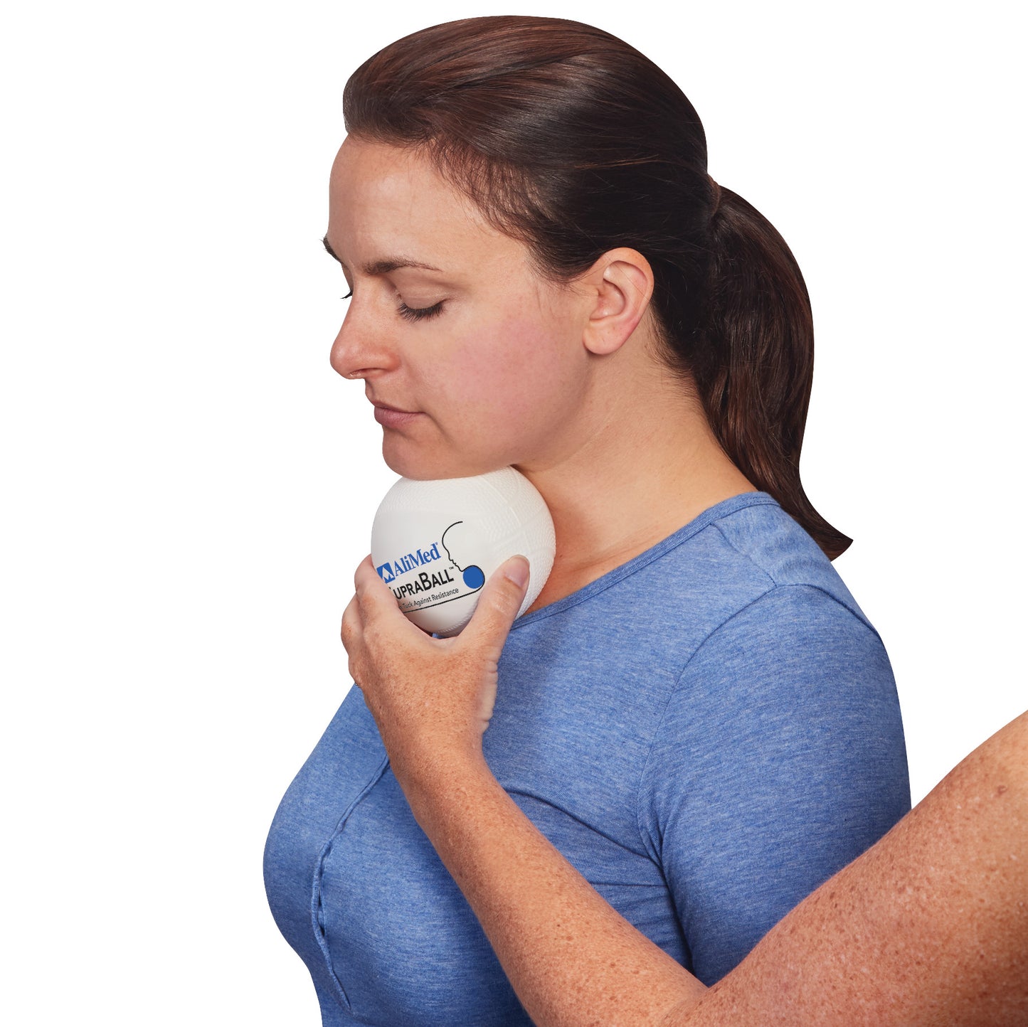 A person uses the AliMed SupraBall Chin Tuck Against Resistance, holding it under their chin while pressing lightly with a hand.