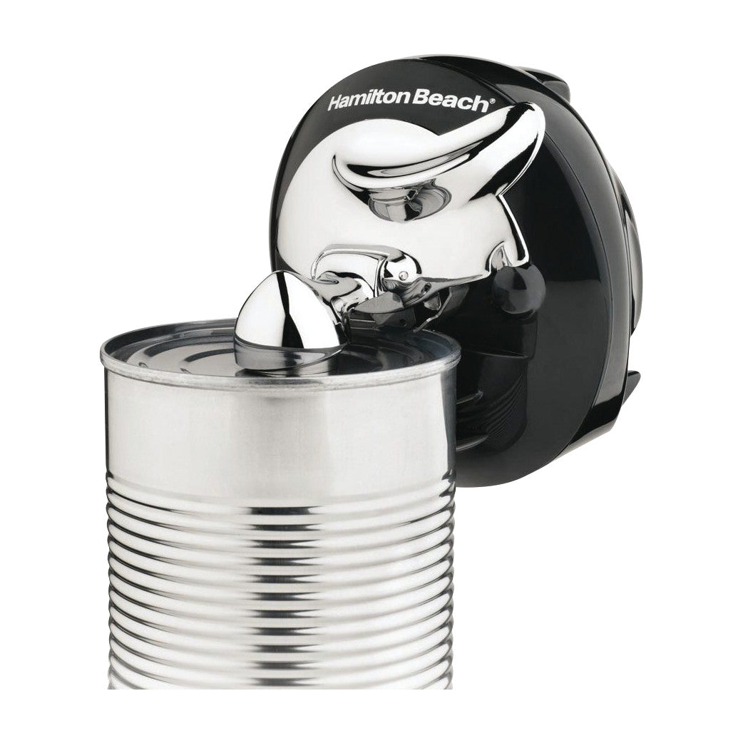 The Walk and Cut Cordless Can Opener is shown in use, automatically opening a metal can with its sleek, compact design.
