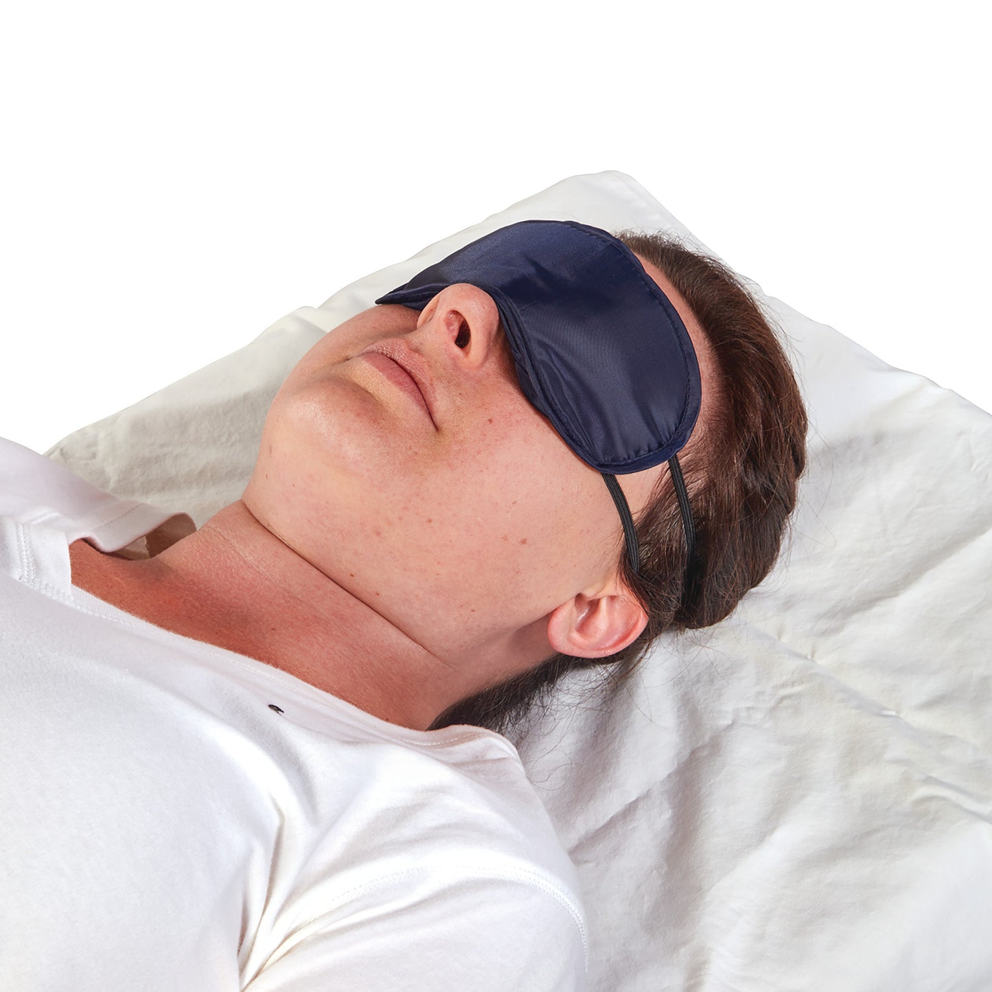 A person lies on a white pillow wearing a Disposable Eye Shade, a dark-colored sleep mask, covering the eyes.
