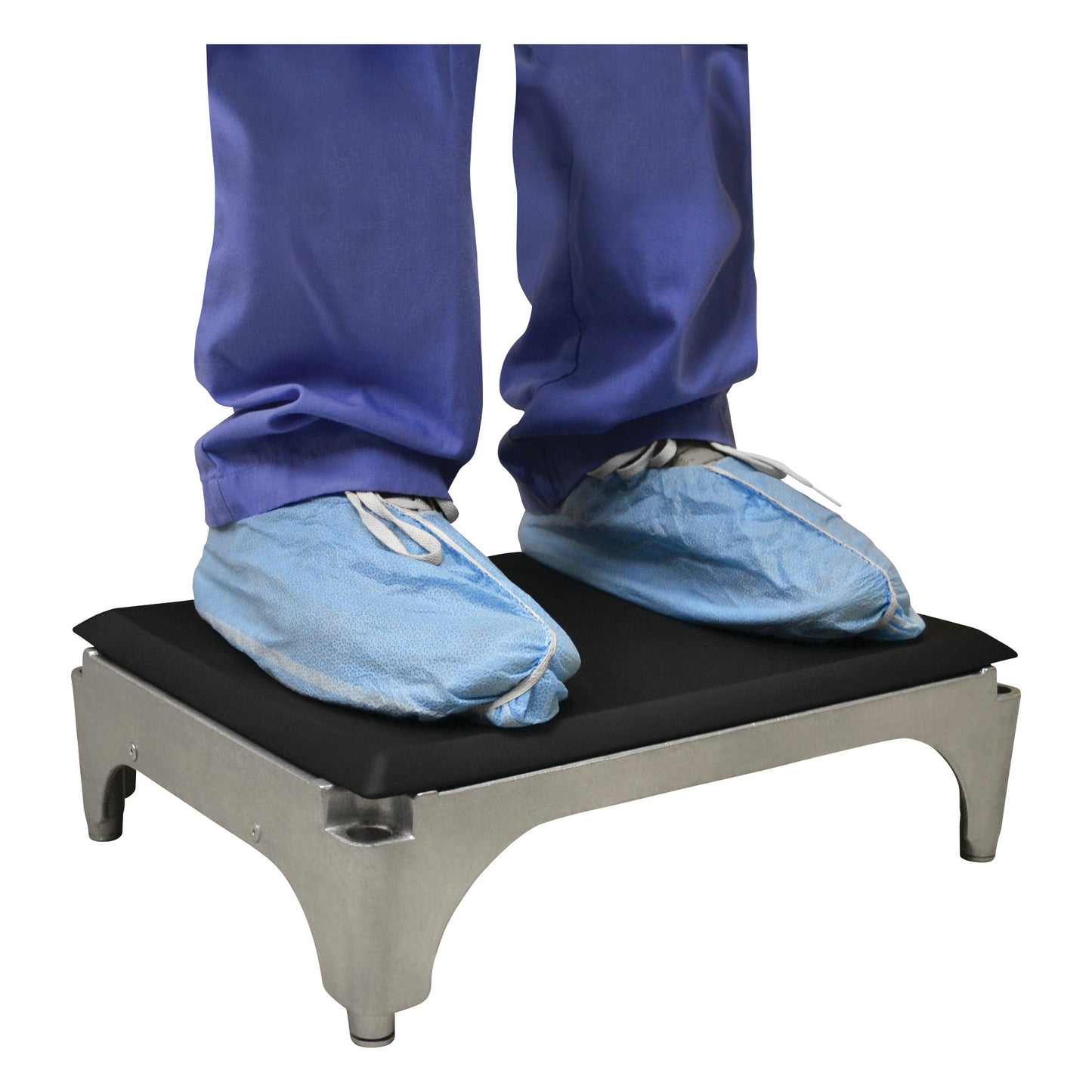 Person wearing blue shoe covers stands on a GelPro NewLife Eco-Pro Reusable Surgical Comfort Stool Mat, elevated on a metal platform.
