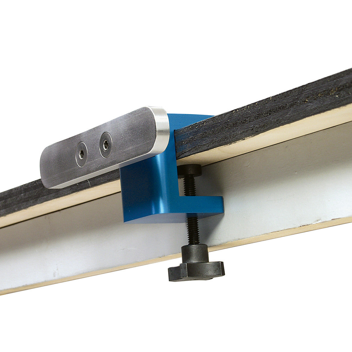 The AliMed FREEDOM O.R. Side Rail Section is shown clamped to a thick edge, featuring a blue metal body and a black adjustment knob.
