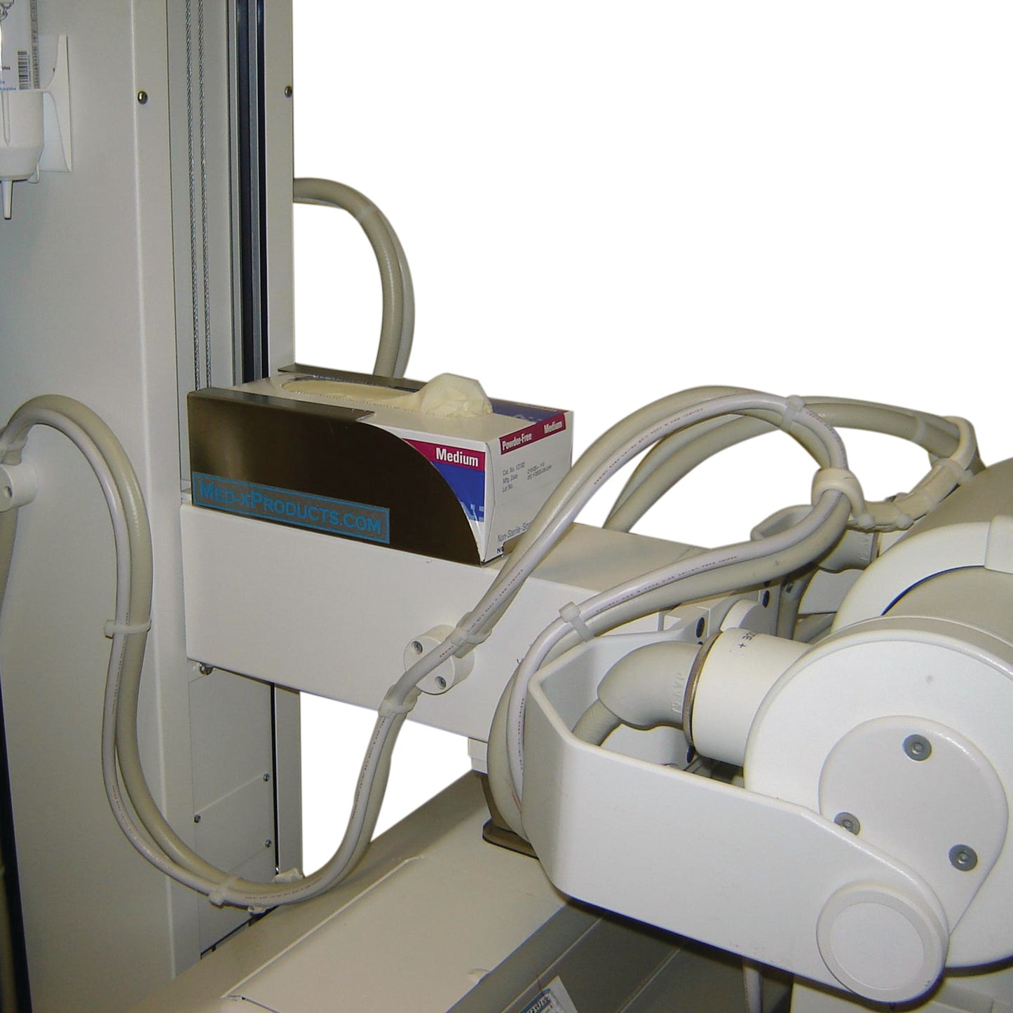 Glove Caddy for Portable X-Ray Unit with cords and a box of gloves attached to a metal rail using hook-and-loop fasteners.