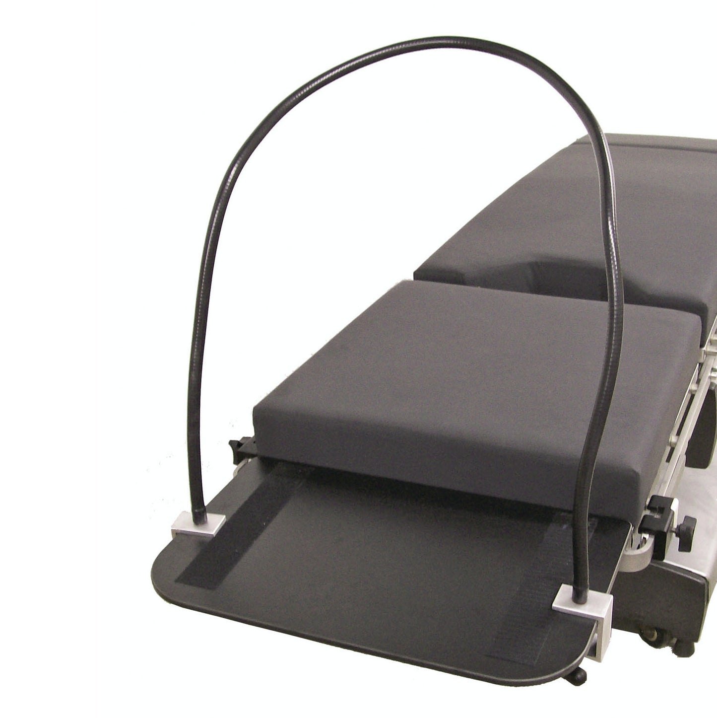 The Malleable Anesthesia Screen with Built-in Table Mounts features a curved frame attached to a medical bed for anesthesia use.