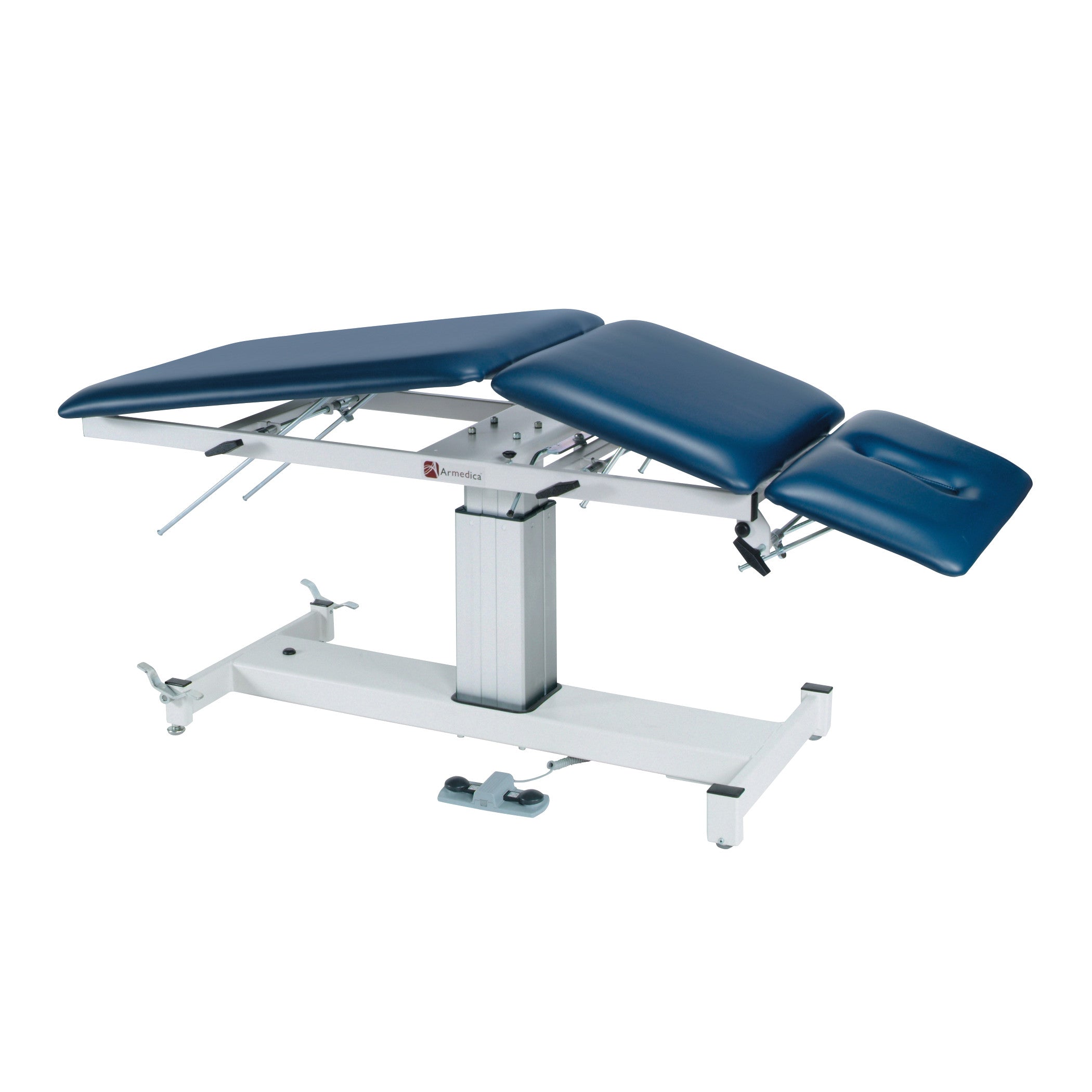 Armedica AM-SP300 Treatment Table with adjustable sections, upholstered in blue and mounted on a sturdy base for medical use.