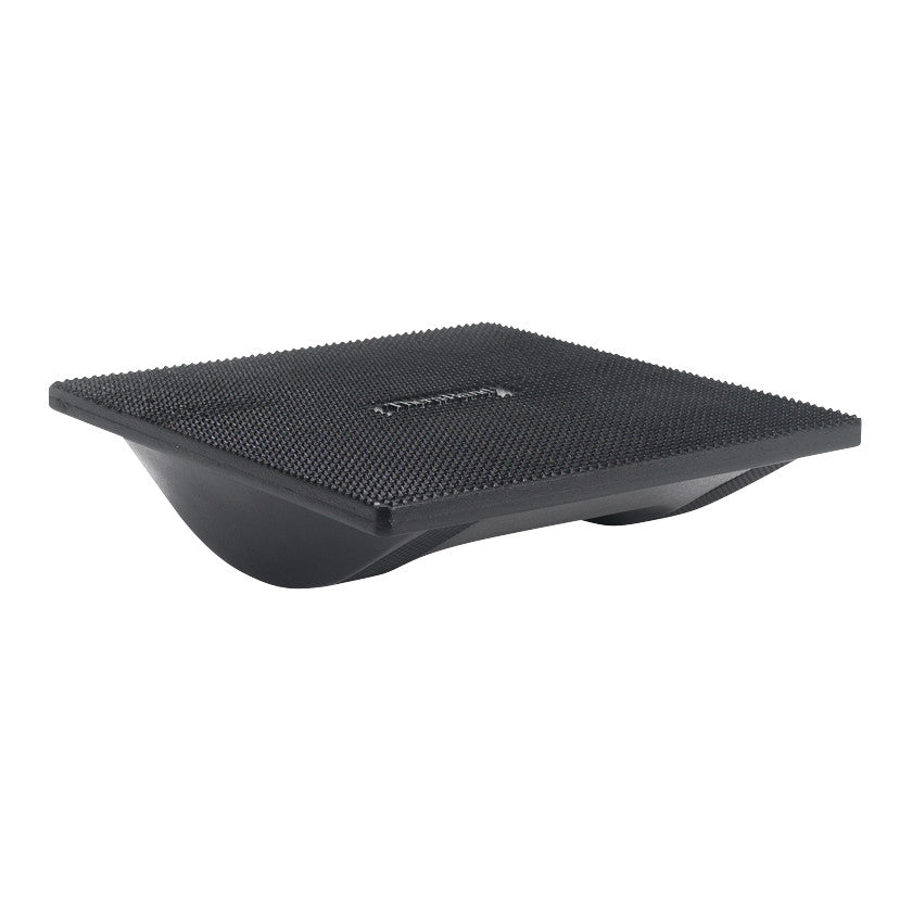 The image displays a black THERABAND Wobble Board and Rocker Board with a textured surface used for balance exercises.