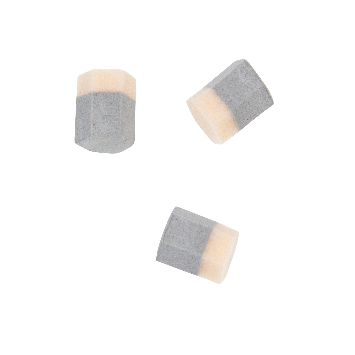 Three hexagonal plugs from the DARCO PegAssist Walker Offloading Insole System, featuring a two-tone design in gray and beige.