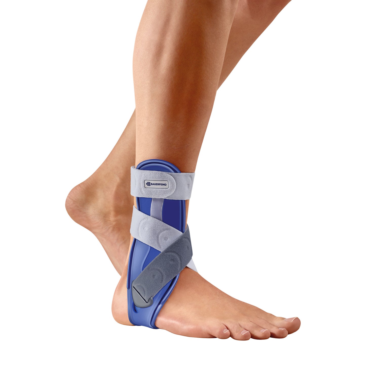 A leg wearing the Bauerfeind MalleoLoc ankle brace with blue and gray supports and adjustable straps for stability and support.