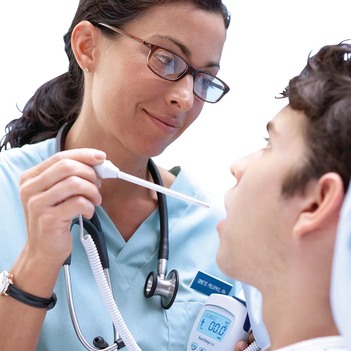 A healthcare professional uses the Welch Allyn SureTemp Plus 692 Electronic Thermometer to take a patient's temperature orally.
