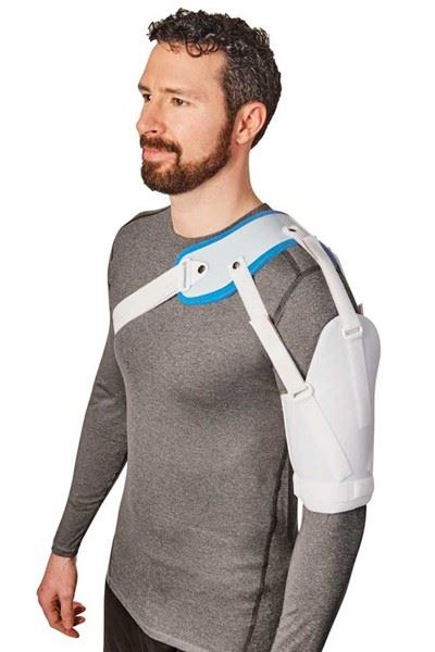 man wearing shoulder sling