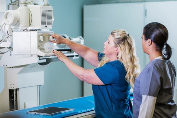 nurses using X-Ray machine