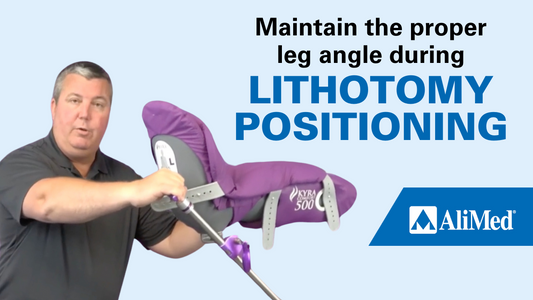 man showing how the floating boot works on the lithotomy stirrup