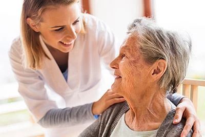 nurse smiling with patient