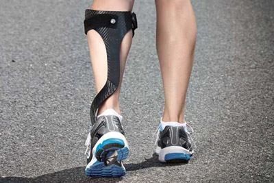 person walking with AFO brace