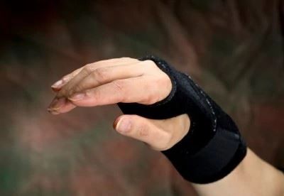 person wearing a hand brace