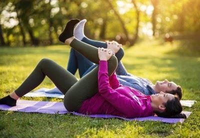 people stretching in the park
